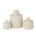 Set de 3 boîtes déco Olympe en ciment beige crème formes géométriques.