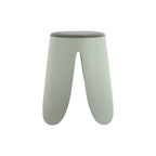 Vue de profil du tabouret contemporain vert pastel empilable.