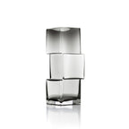Grand vase sculptural design en verre gris avec blocs asymétriques décalés.