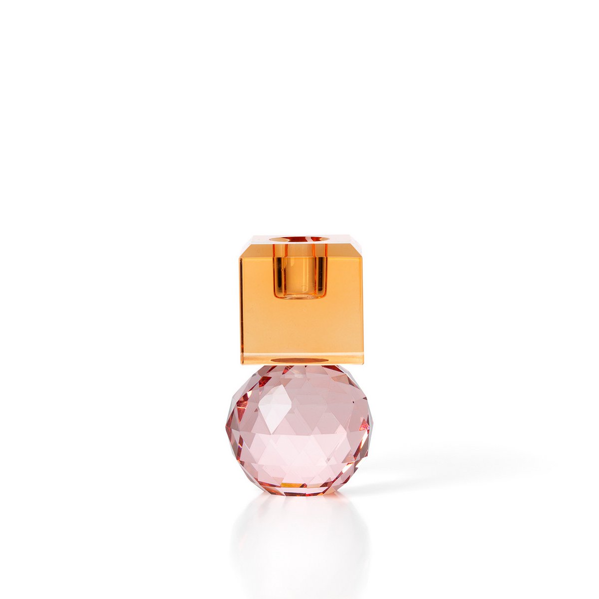 Petit bougeoir décoratif façon bijou avec une base sphérique facettée rose quartz et un cube supérieur ambré citrine.
