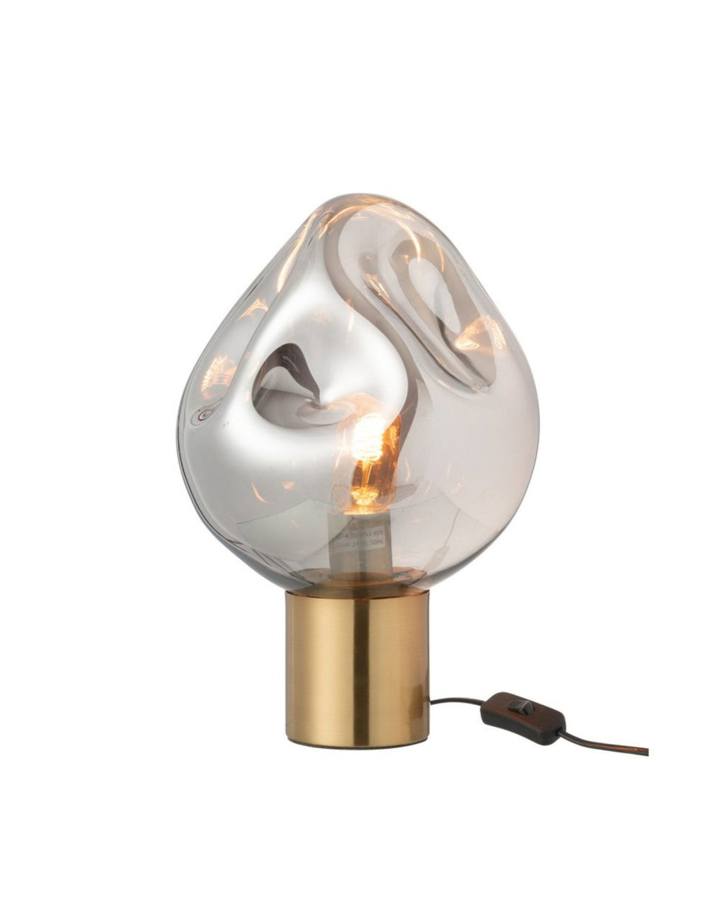 Lampe de table contemporaine éteinte, montrant les reflets du verre bosselé gris.