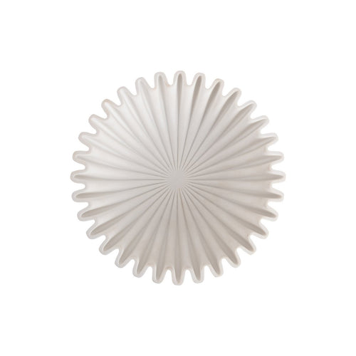 Vue de dessus du bol vague moyen blanc mat, motif rayonnant en étoile, design sculptural nordique