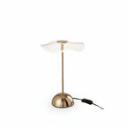 Lampe à poser FLORA Mini LED en métal doré brillant abat-jour disque en verre strié transparent tombant légèrement pied tige fine dorée base demi-sphère dorée câble noir Ø23,5×31 cm fond blanc