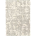 Tapis rectangulaire design moderne Brixy aux motifs abstraits beige et gris aspect laine.