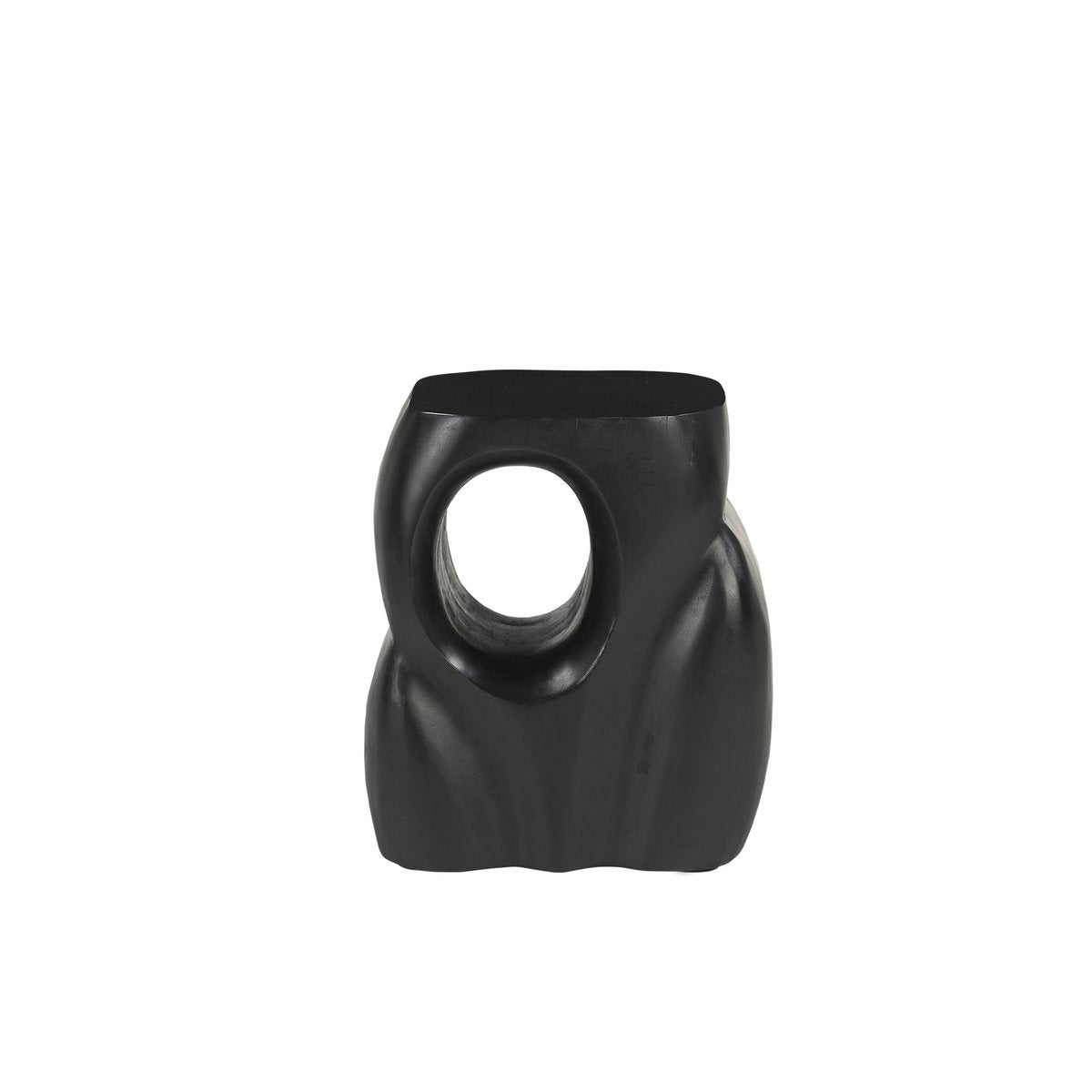 Table d'appoint sculpturale en bois massif noir mat avec une forme organique asymétrique et évidée.