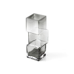 Profil du vase asymétrique en verre fumé mettant en valeur son architecture originale.